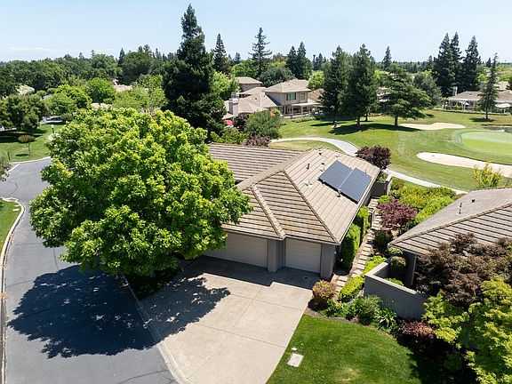 3rd image of 9516 Golf Course Ln