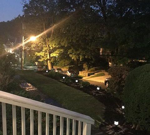 Night view from front porch with solar lit pathway