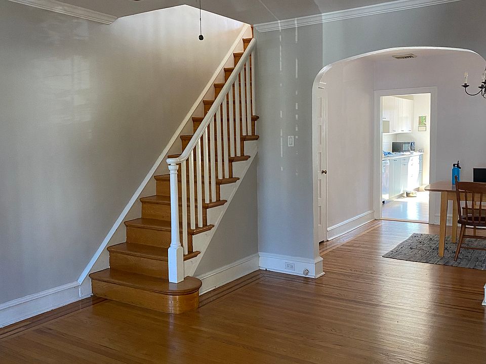 View from the front door of the living room, kitchen and into the kitchen beyond.
