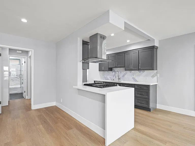 Open-Concept Kitchen and Hall Bathroom