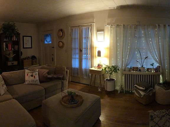 Large living room French doors open to private covered porch