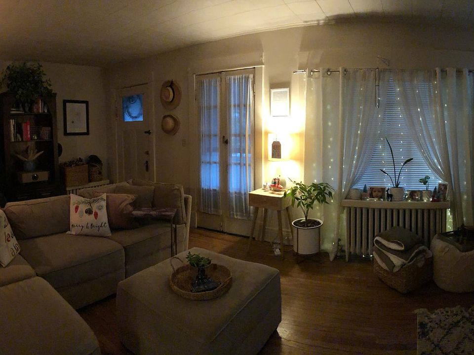 Large living room French doors open to private covered porch
