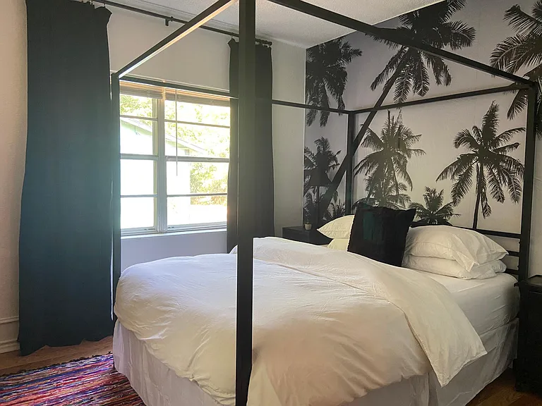 Another comfortable, spacious and calmingly tropical bedroom