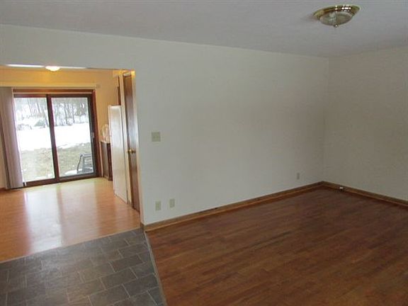 Belshire Front entrance living room right, kitchen left