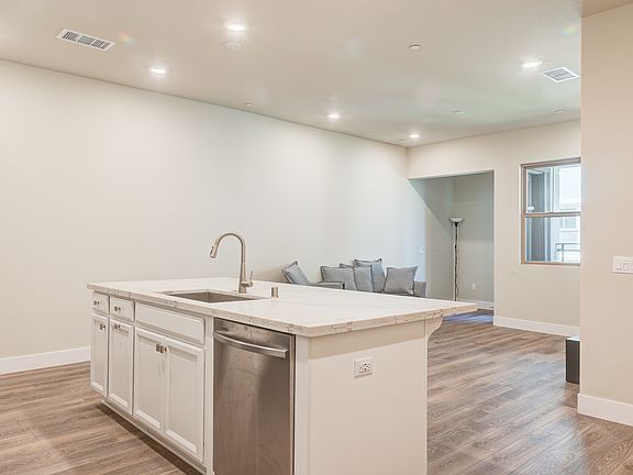 Kitchen with view of living room