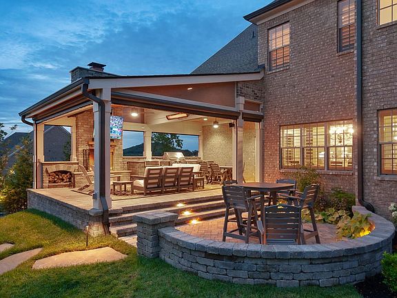 Covered Back Porch & Stone Patio