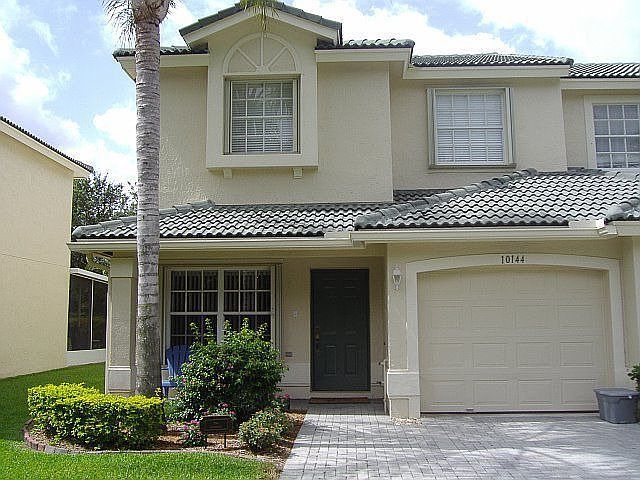 End unit townhouse on quiet street with homes only on one side of the road 