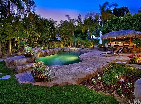 Lushly landscaped, fun palapa-style BBQ center & more!
