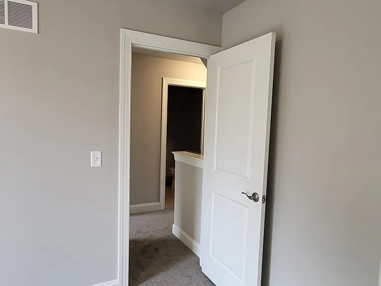 To the Hallway from the Third Bedroom