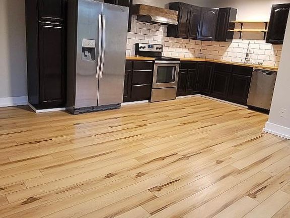 Fridge with water and ice maker, new dishwasher and hood plus a full pantry