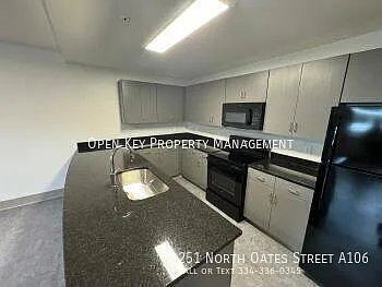 Charming 1-Bed Oasis in Dothan's Heart Your Perfect Urban Retreat! — Photo 1
