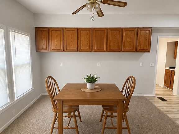 Eat in dining room has extra room for storage. Decor for staging purposes only. This is an unfurnished home