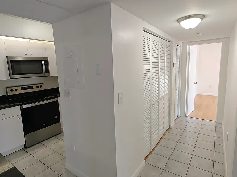 Kitchen and Hallway to Master Bedroom