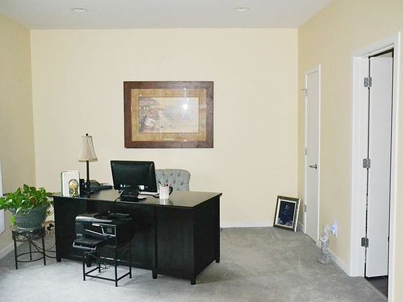 The den is just off the front entry.  It could be a 5th bedroom with direct access to a full bath and a closet.  The room currently has French doors to close it off from the front entrance.