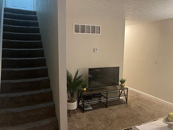 Living room and stairs to the upper level