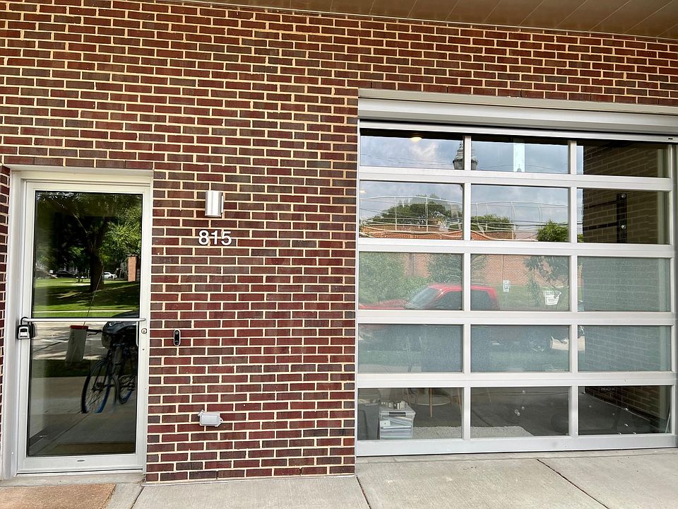 Main entry and overhead door to 1st floor living.