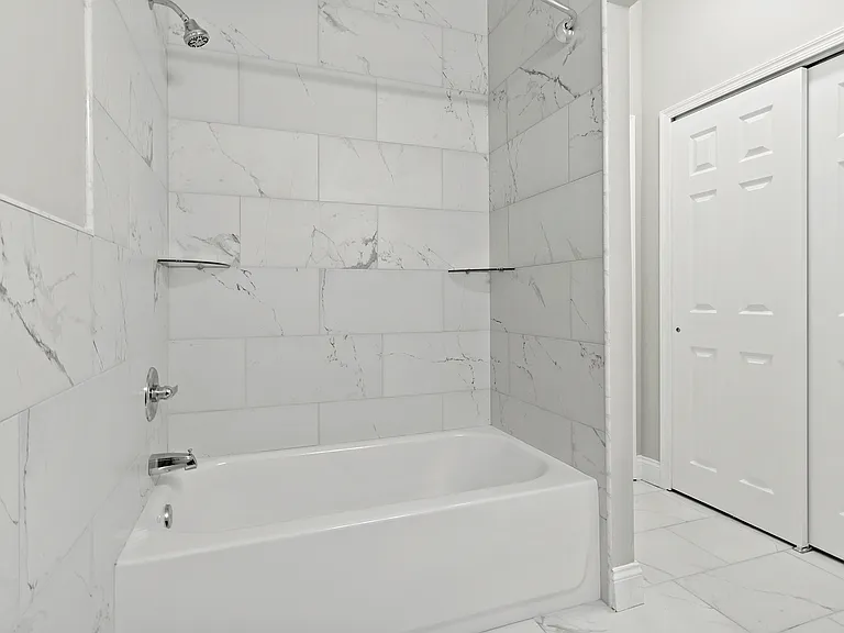 Indulge in the elegance of this luxurious marble bathroom designed for ultimate relaxation.