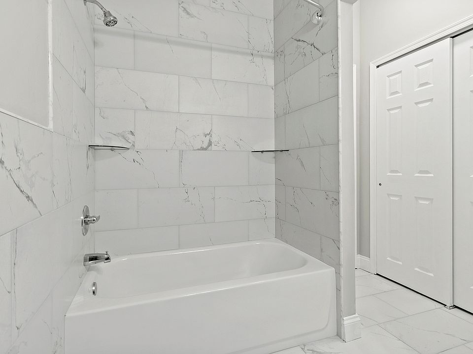 Indulge in the elegance of this luxurious marble bathroom designed for ultimate relaxation.