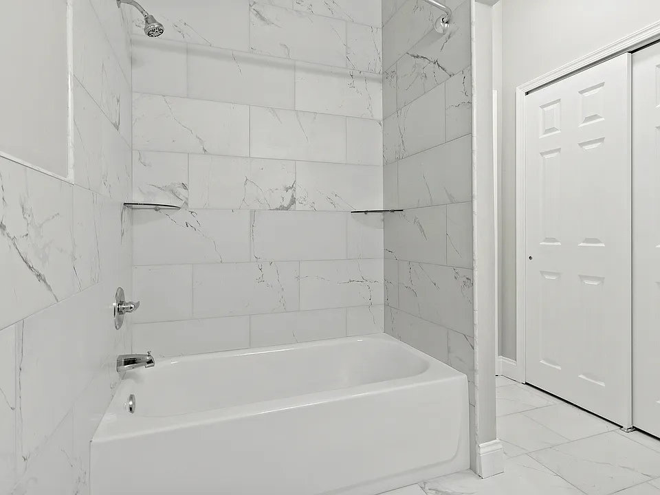 Indulge in the elegance of this luxurious marble bathroom designed for ultimate relaxation.