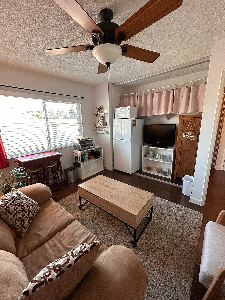 living room, lift top coffee table, kitchennet with table leaf to expand size for dinning. - Pinewood Rd