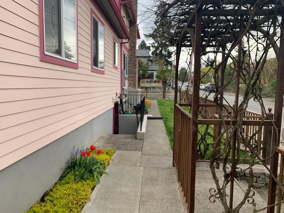 View of trellis and stairs, entry is West facing