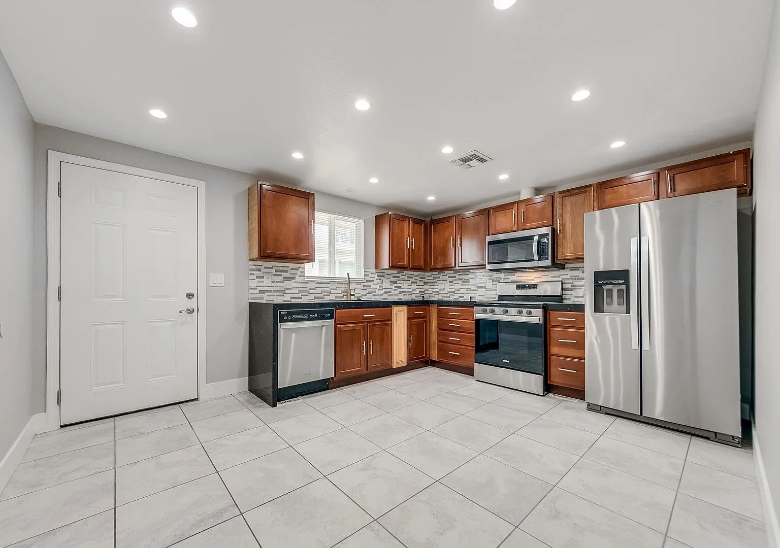 Move-In Ready Two-Bedroom with Modern Finishes & Stainless-Steel Appliances — Photo 1