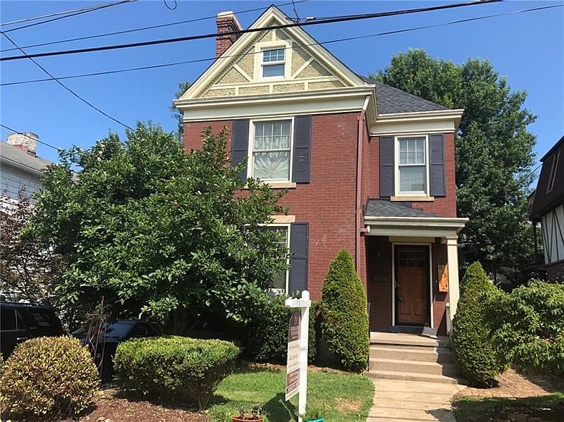 Front. Welcome to 625 Fountain Street, a beautiful brick Victorian in the heart of Sewickley Village.