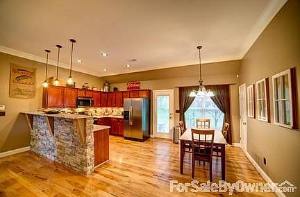 Kitchen/Dining
						:
						Updated lighting, crown molding