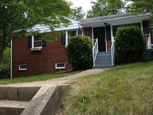 front of house -- brick house, sturdy, well-built