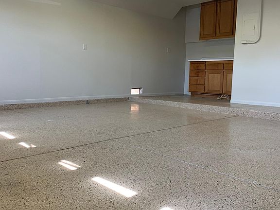 Storage cabinets, work space and overhead lighting