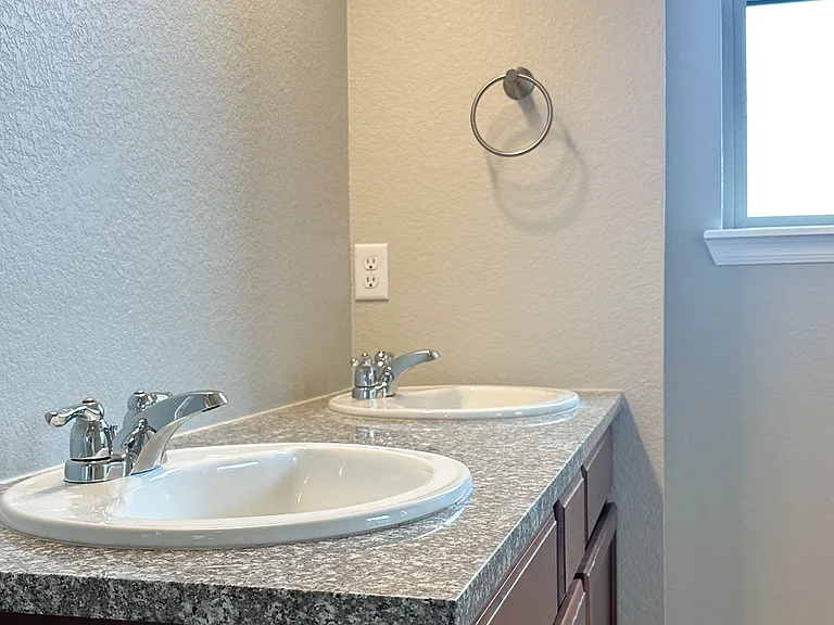 Double Vanity in Master Bath with Western Window