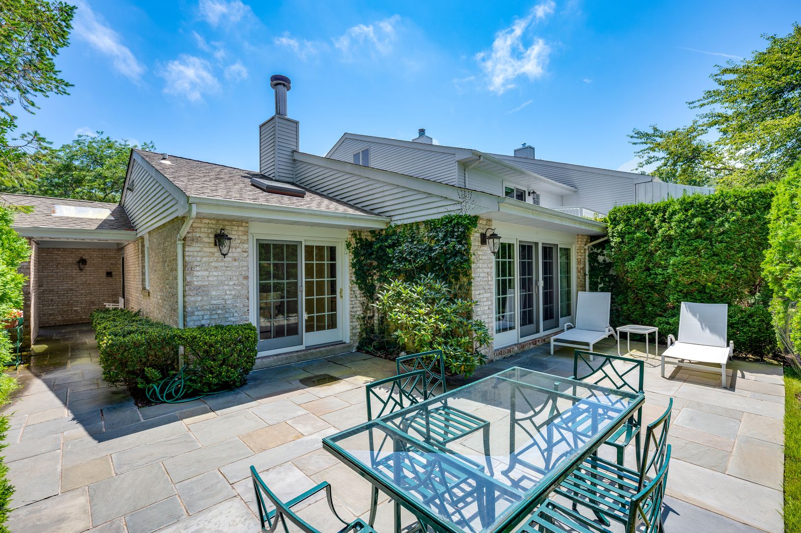 Patio with Sliding Andersen Doors to Kitchen and Dining