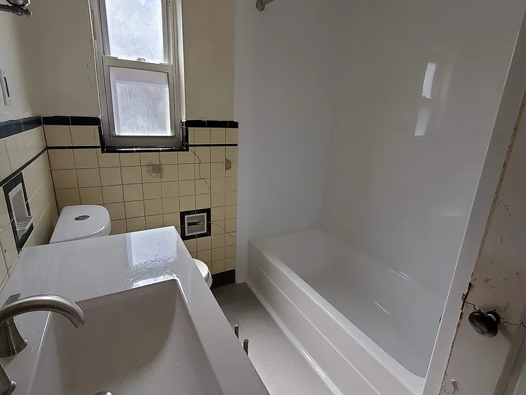 Bathroom - new tub, vanity and toilet