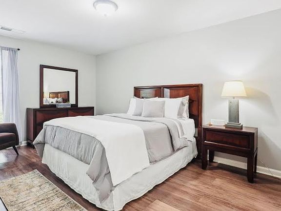 Generously sized bedroom with lots of natural light