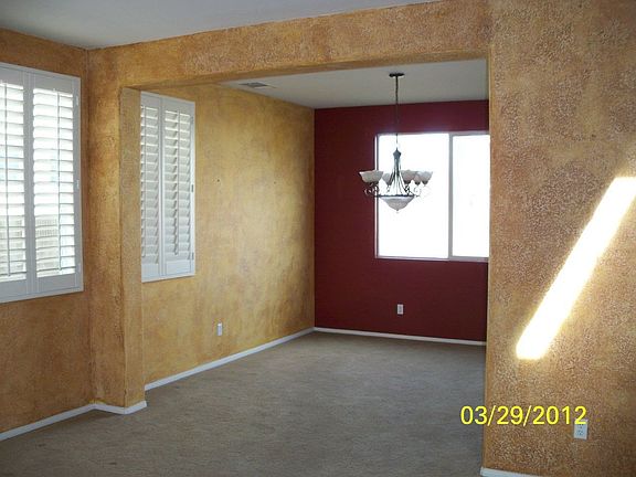 Main Living room with Wooden shutters & custom paint