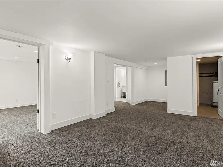 The fully finished daylight basement offers a spacious family room, large bedroom, full bathroom, laundry room with a brand-new washer and dryer, and endless flexibility for entertaining, working from home, or relaxing.