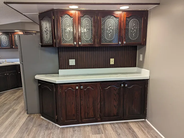 Built-in dinette cabinets with recessed lighting
