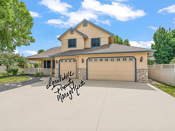 3 large car garage and HUGE driveway