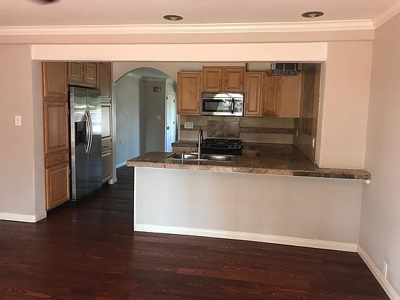 View of open kitchen from family room