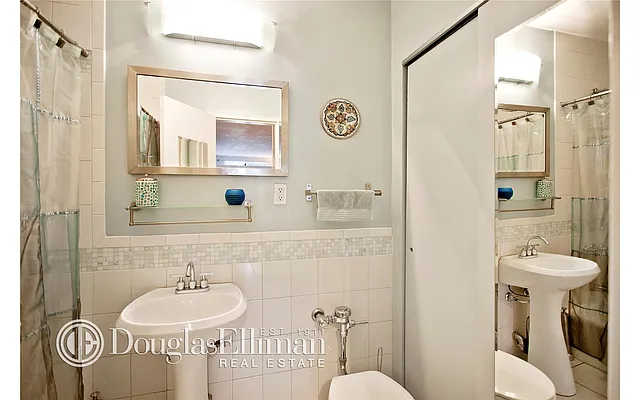 Sold by Douglas Elliman | media 13