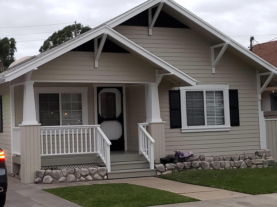 Front of house just after new paint of exterior in Oct. 2020, (planters have since been re-landscaped with plants and flowers.)