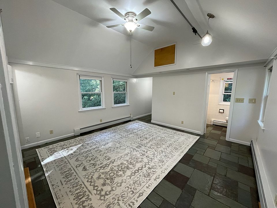 Large living room with vaulted ceiling as you enter the apartment.