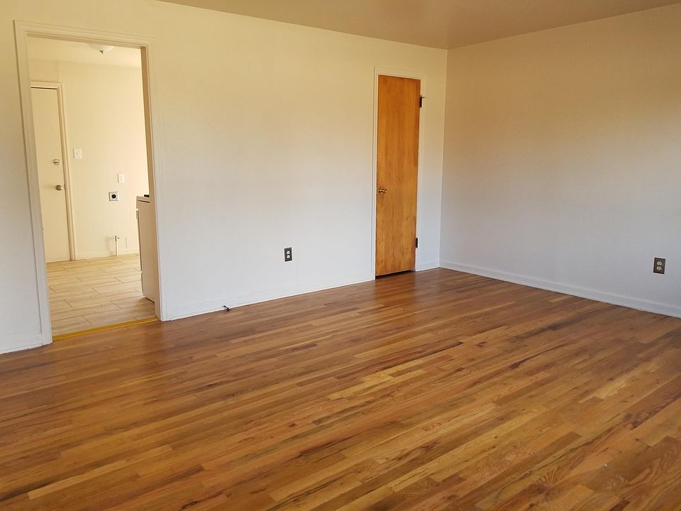 Hardwood flooring throughout unit