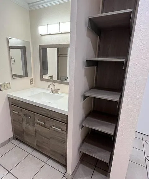 Primary bedroom 2 vanity and linen closet