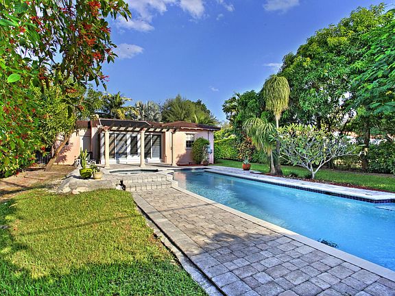 Pool and back yard. Pool is not a lap pool.