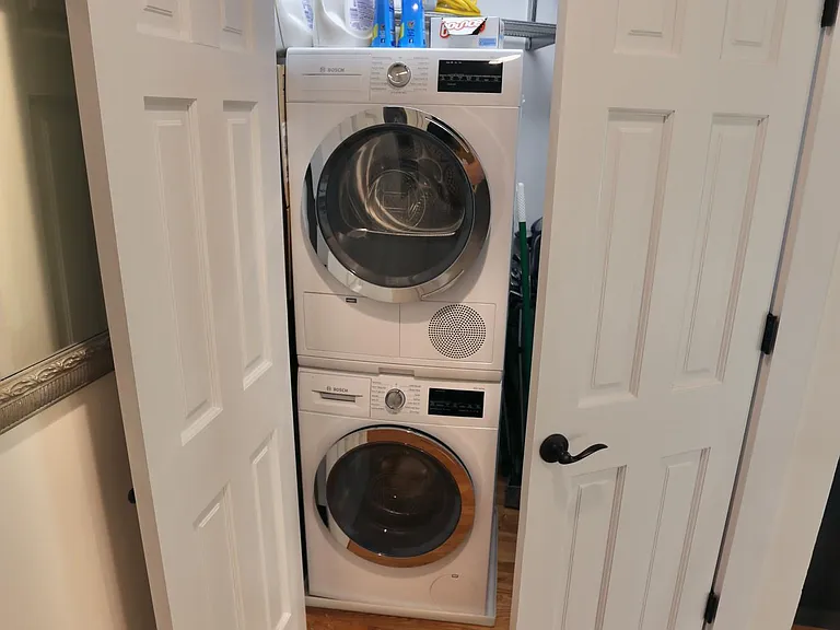 In-unit laundry - Bosch 800-series.
Container Store Elfa system shelving in closet.