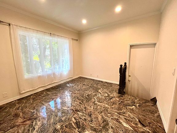 West side room near the entrance connected to the garage and pantry to the kitchen