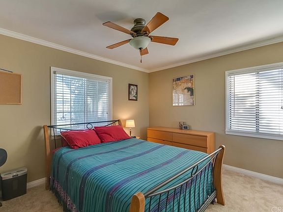 Master bedroom with crown molding.