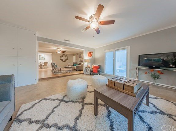 Notice the sliding door with integrated blinds.