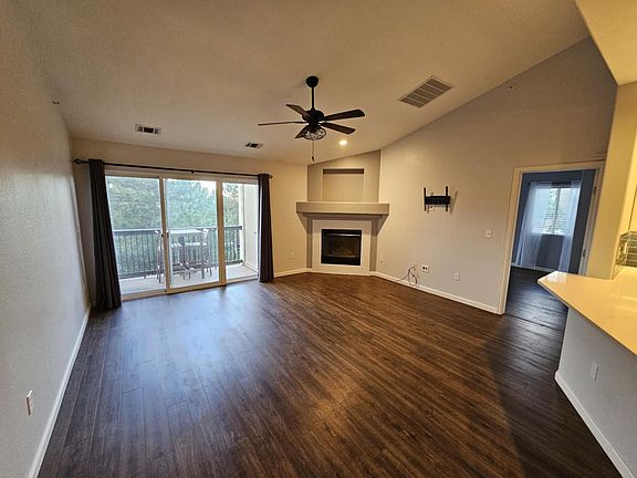 Living room with fireplace and TV mount